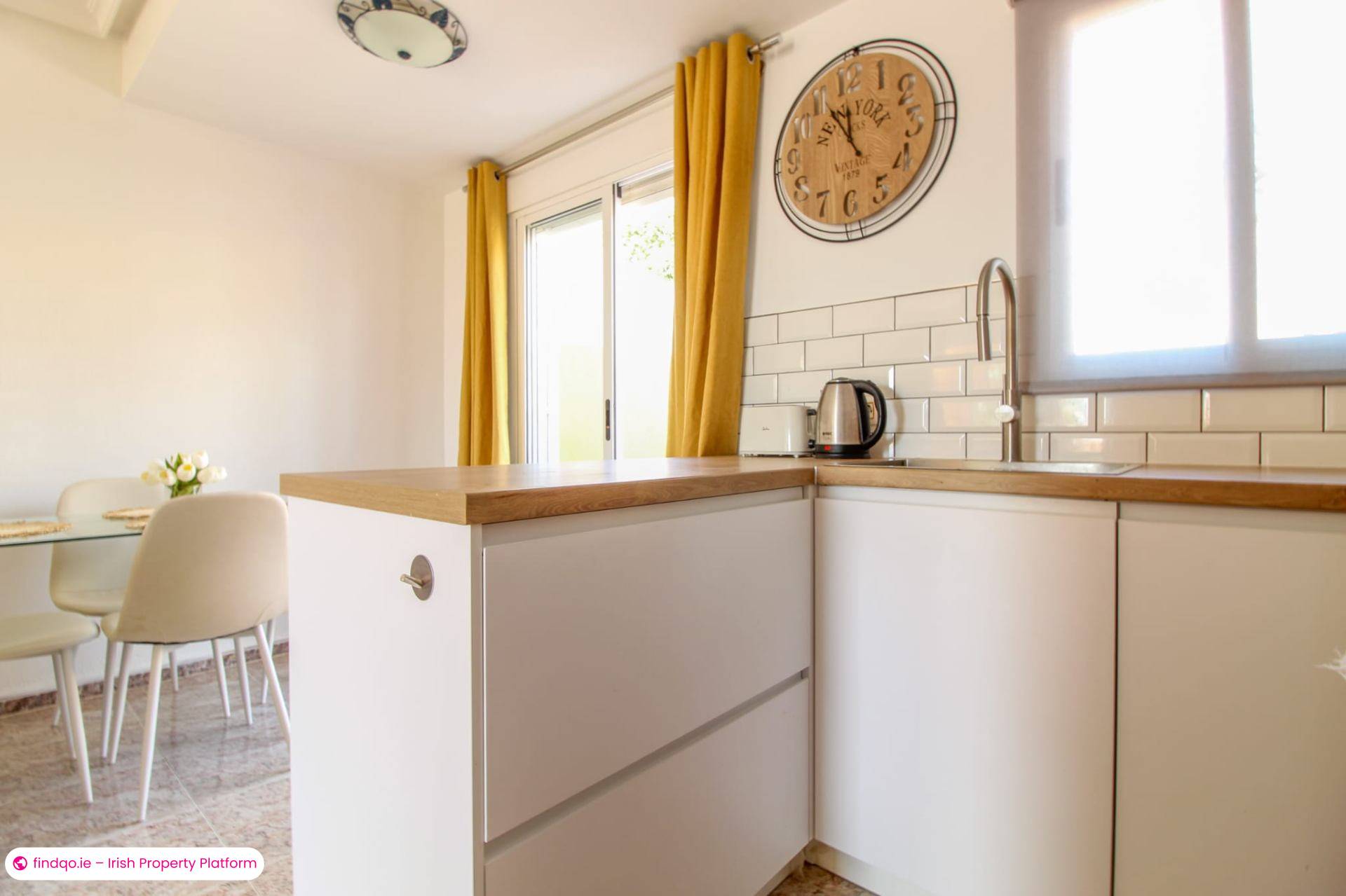 Buy a Cozy 2 Bed 2 Bath Townhouse with Garden and Parking Abroad